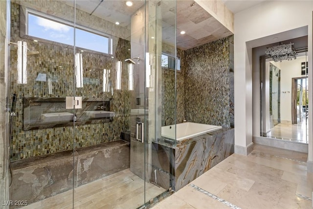 8 Meadowhawk Ln, Las Vegas, NV 89135 - full bathroom featuring a garden tub, a stall shower, and a sink
