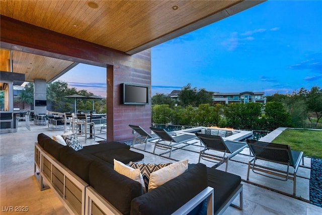 8 Meadowhawk Ln, Las Vegas, NV 89135 - view of patio / terrace featuring an outdoor living space with a fire pit