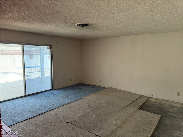 1674 Seneca Ln, Las Vegas, NV 89169 - empty room with a textured ceiling
