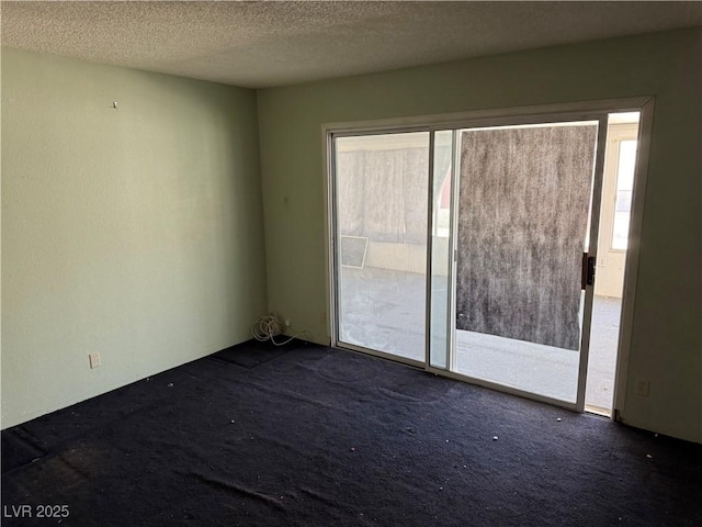 1674 Seneca Ln, Las Vegas, NV 89169 - empty room with carpet and a textured ceiling