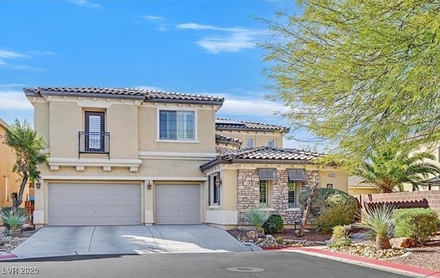 10001 Blairwood Ct, Las Vegas, NV 89178 - mediterranean / spanish home featuring a tile roof, a garage, concrete driveway, stone siding, and stucco siding