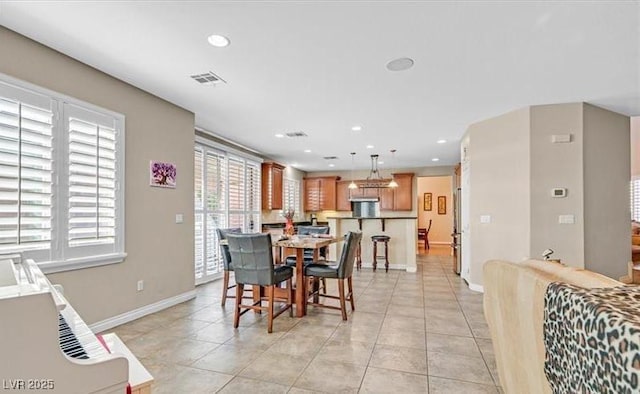 10001 Blairwood Ct, Las Vegas, NV 89178 - dining space with baseboards, recessed lighting, and light tile patterned floors