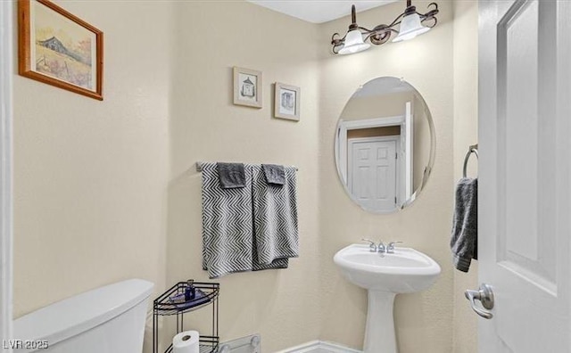 10001 Blairwood Ct, Las Vegas, NV 89178 - half bathroom with toilet and a sink
