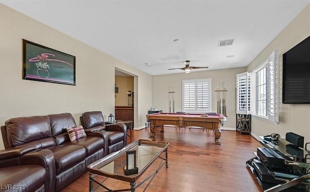 10001 Blairwood Ct, Las Vegas, NV 89178 - living area with pool table, wood finished floors, a ceiling fan, and baseboards