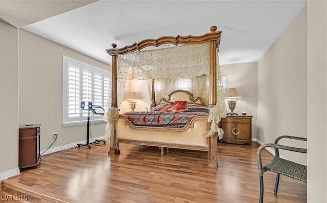 10001 Blairwood Ct, Las Vegas, NV 89178 - bedroom with wood finished floors and baseboards