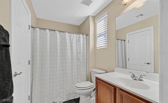 10001 Blairwood Ct, Las Vegas, NV 89178 - bathroom with vanity, toilet, and curtained shower