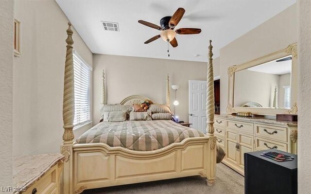 10001 Blairwood Ct, Las Vegas, NV 89178 - bedroom featuring light carpet and ceiling fan