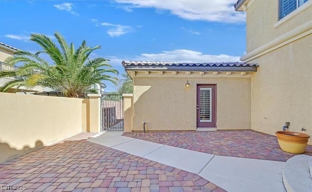 10001 Blairwood Ct, Las Vegas, NV 89178 - view of patio featuring a gate