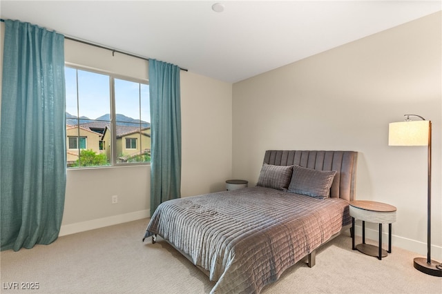 230 Cactus Sunrise St, Las Vegas, NV 89138 - carpeted bedroom with a mountain view and baseboards