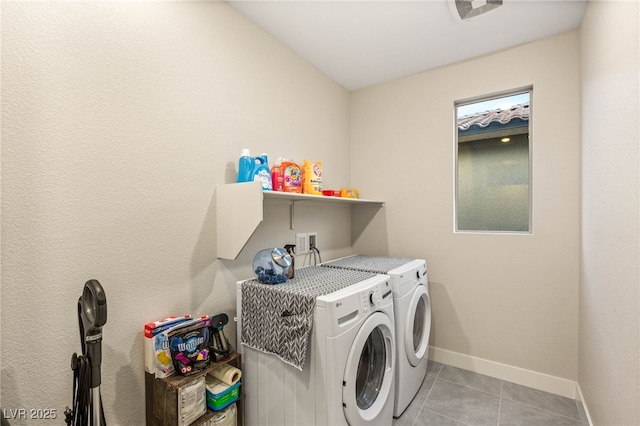 230 Cactus Sunrise St, Las Vegas, NV 89138 - laundry room with separate washer and dryer, baseboards, and light tile patterned floors