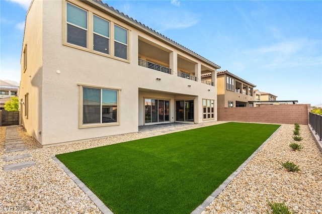 230 Cactus Sunrise St, Las Vegas, NV 89138 - rear view of house featuring a balcony, stucco siding, and a tiled roof
