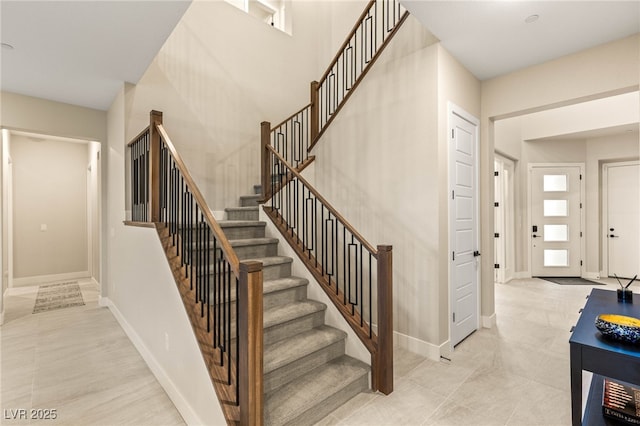 230 Cactus Sunrise St, Las Vegas, NV 89138 - staircase with baseboards and tile patterned floors