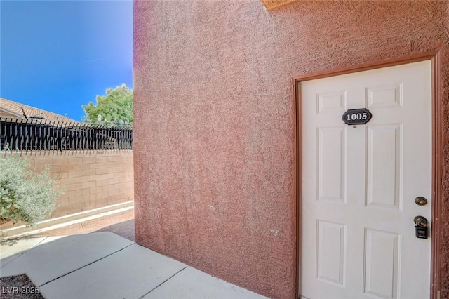 4730 E Craig Rd Unit 1005, Las Vegas, NV 89115 - entrance to property with stucco siding and a patio area