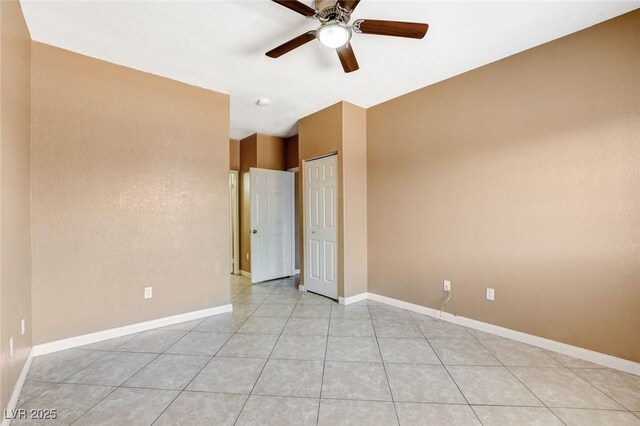 4730 E Craig Rd Unit 1005, Las Vegas, NV 89115 - unfurnished room with a ceiling fan and light tile patterned floors