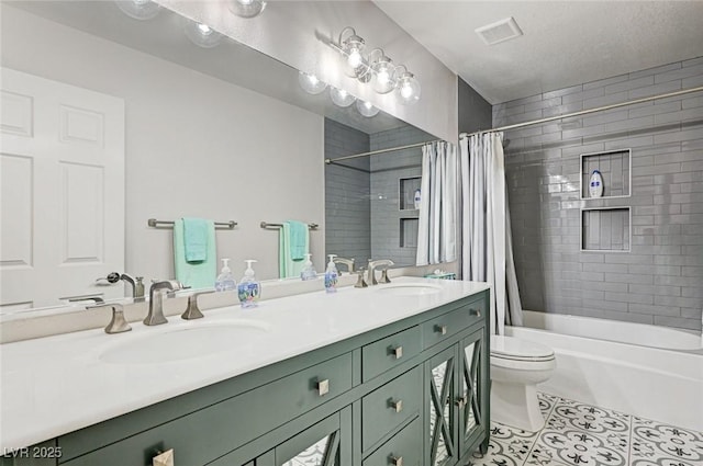 2036 Deer Springs Dr, Henderson, NV 89074 - full bath with tile patterned floors, double vanity, shower / bath combo, and toilet