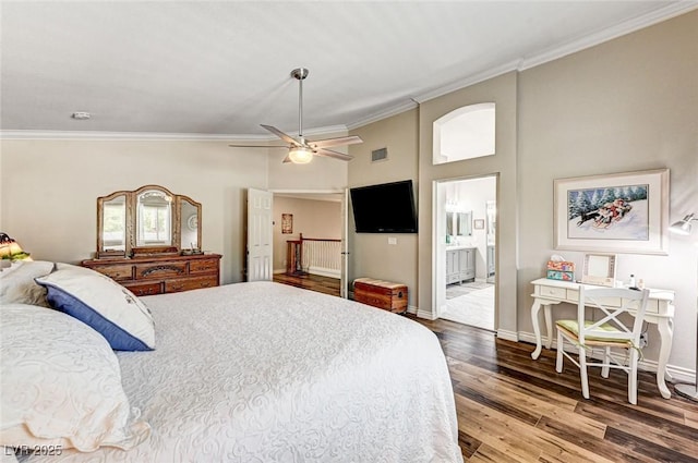 2036 Deer Springs Dr, Henderson, NV 89074 - bedroom with wood finished floors, crown molding, baseboards, ensuite bathroom, and a towering ceiling