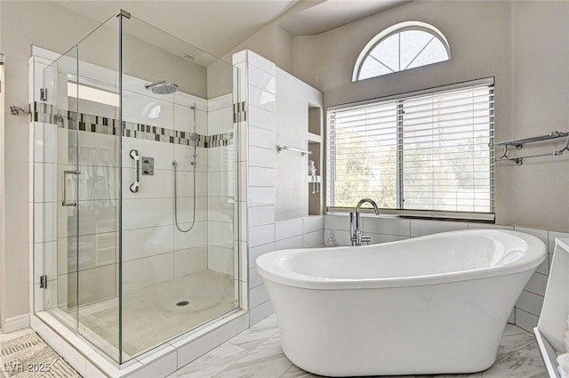 2036 Deer Springs Dr, Henderson, NV 89074 - full bath featuring marble finish floors, a stall shower, and a freestanding tub