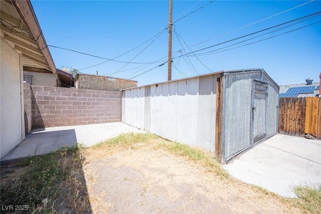 4516 E Flamingo Rd, Las Vegas, NV 89121 - fenced backyard with a patio area