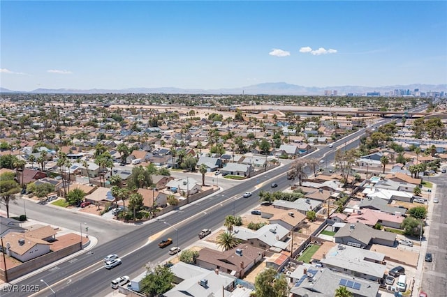 4516 E Flamingo Rd, Las Vegas, NV 89121 - aerial overview of property's location featuring nearby suburban area and a mountainous background