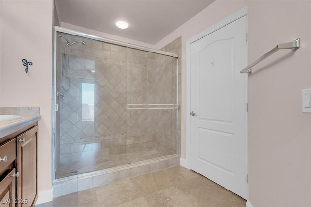 87 E Agate Ave Unit 403, Las Vegas, NV 89123 - bathroom with a shower stall, vanity, and tile patterned floors