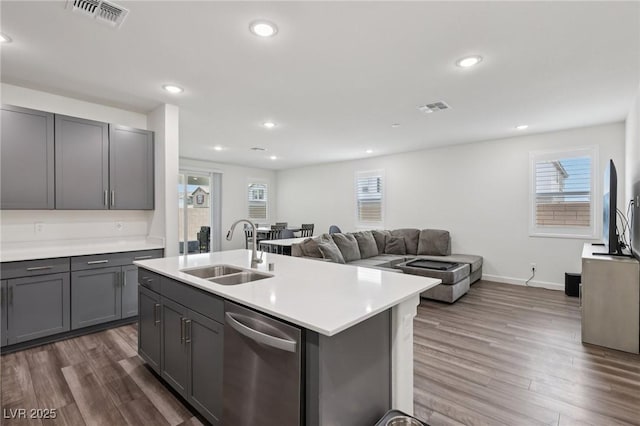 3024 River Brook Ct, Las Vegas, NV 89139 - kitchen with a sink, dishwasher, gray cabinets, dark wood finished floors, and recessed lighting