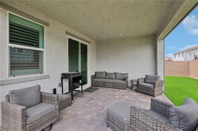 3024 River Brook Ct, Las Vegas, NV 89139 - fenced backyard featuring an outdoor hangout area, a patio area, and grilling area