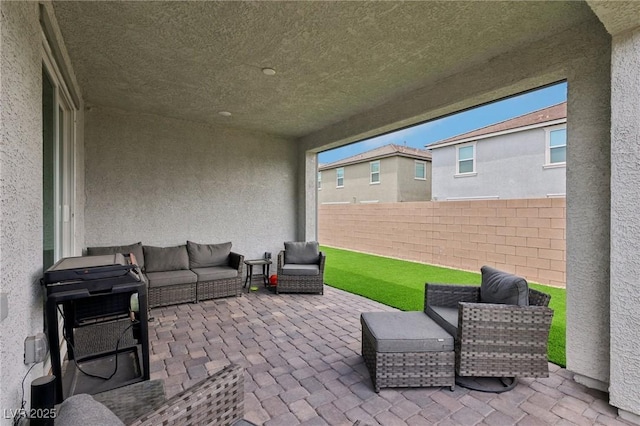 3024 River Brook Ct, Las Vegas, NV 89139 - fenced backyard featuring a patio area and an outdoor living space