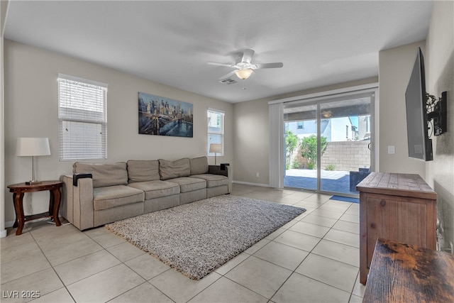 9950 Coyote Echo Ct, Las Vegas, NV 89166 - living room featuring light tile patterned floors and ceiling fan