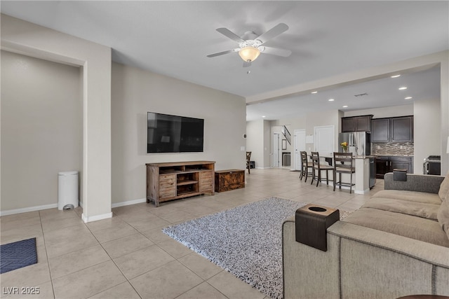 9950 Coyote Echo Ct, Las Vegas, NV 89166 - living room featuring light tile patterned flooring, a ceiling fan, and recessed lighting