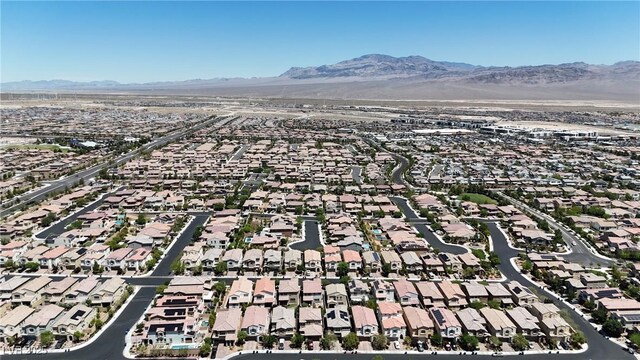 9950 Coyote Echo Ct, Las Vegas, NV 89166 - aerial perspective of suburban area with mountains