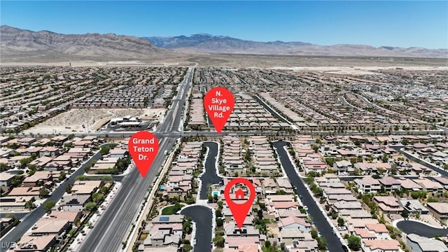 9950 Coyote Echo Ct, Las Vegas, NV 89166 - aerial view of residential area featuring a mountainous background