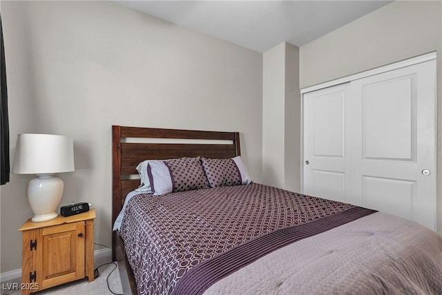 9950 Coyote Echo Ct, Las Vegas, NV 89166 - bedroom featuring light colored carpet and a closet
