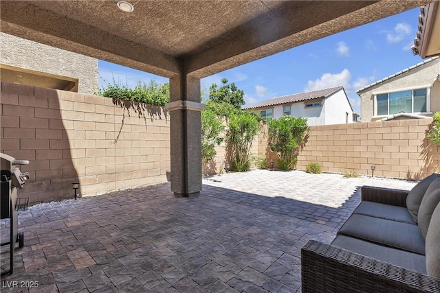 9950 Coyote Echo Ct, Las Vegas, NV 89166 - fenced backyard featuring a patio area