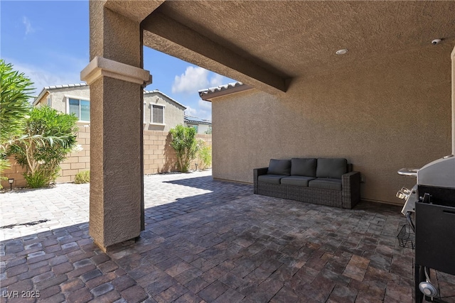 9950 Coyote Echo Ct, Las Vegas, NV 89166 - view of patio / terrace with area for grilling and an outdoor living space