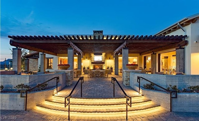 9950 Coyote Echo Ct, Las Vegas, NV 89166 - view of patio / terrace with a pergola, an outdoor kitchen, a deck, and a bar