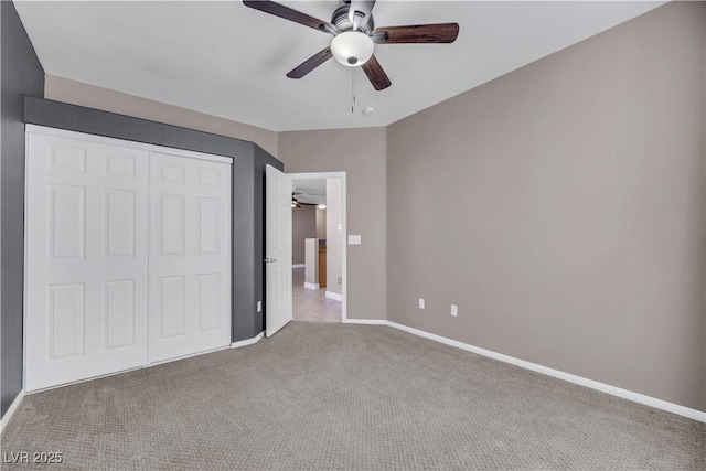 108 Lemon Glaze St Unit 202, Las Vegas, NV 89145 - unfurnished bedroom with carpet flooring, baseboards, a closet, and ceiling fan