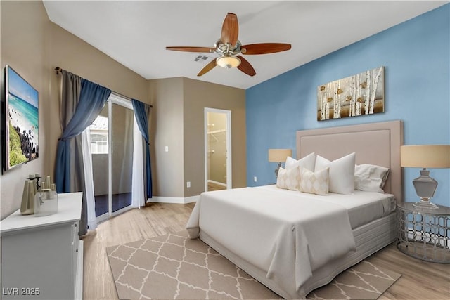 108 Lemon Glaze St Unit 202, Las Vegas, NV 89145 - bedroom featuring light wood-style flooring, ceiling fan, ensuite bath, and baseboards