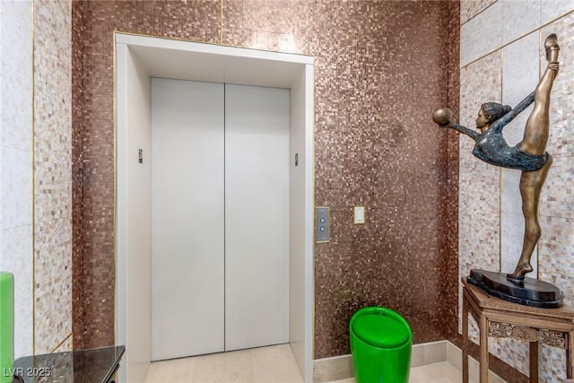 9101 Alta Dr Unit 203, Las Vegas, NV 89145 - interior space with elevator and tile patterned flooring