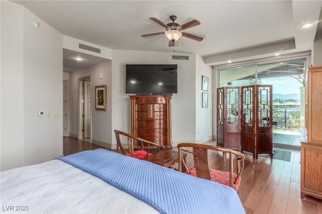 9101 Alta Dr Unit 203, Las Vegas, NV 89145 - bedroom featuring wood finished floors, access to outside, french doors, a ceiling fan, and recessed lighting