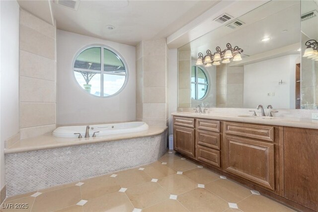 9101 Alta Dr Unit 203, Las Vegas, NV 89145 - full bath featuring double vanity, a garden tub, and tile patterned flooring