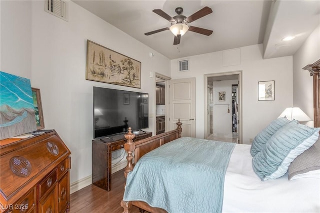 9101 Alta Dr Unit 203, Las Vegas, NV 89145 - bedroom with wood finished floors, baseboards, and a ceiling fan