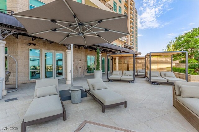 9101 Alta Dr Unit 203, Las Vegas, NV 89145 - view of patio featuring an outdoor hangout area and french doors