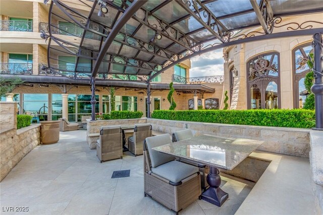 9101 Alta Dr Unit 203, Las Vegas, NV 89145 - view of patio with outdoor dining area
