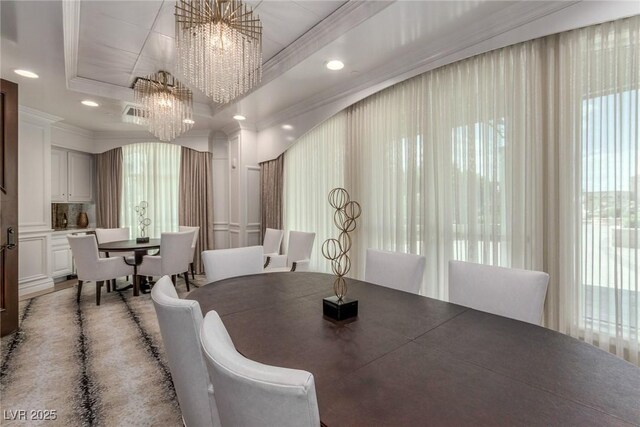 9101 Alta Dr Unit 203, Las Vegas, NV 89145 - dining area with a chandelier, a tray ceiling, crown molding, and recessed lighting