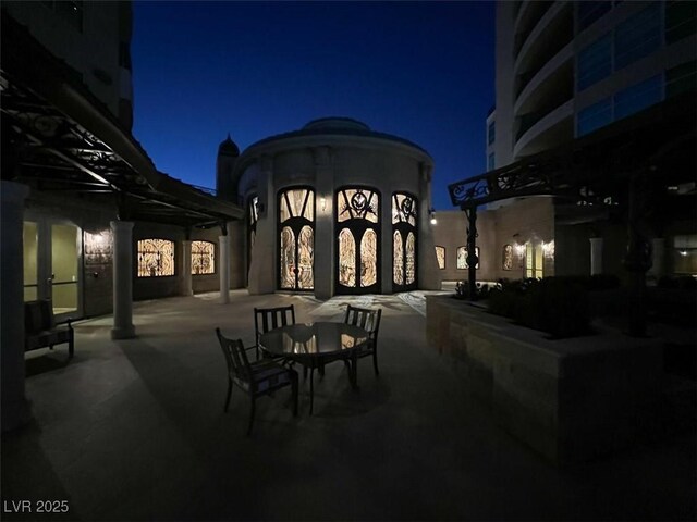9101 Alta Dr Unit 203, Las Vegas, NV 89145 - patio at twilight with a patio