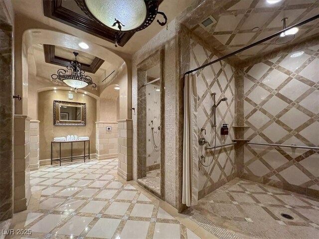 9101 Alta Dr Unit 203, Las Vegas, NV 89145 - wine area with inlaid floor details and arched walkways