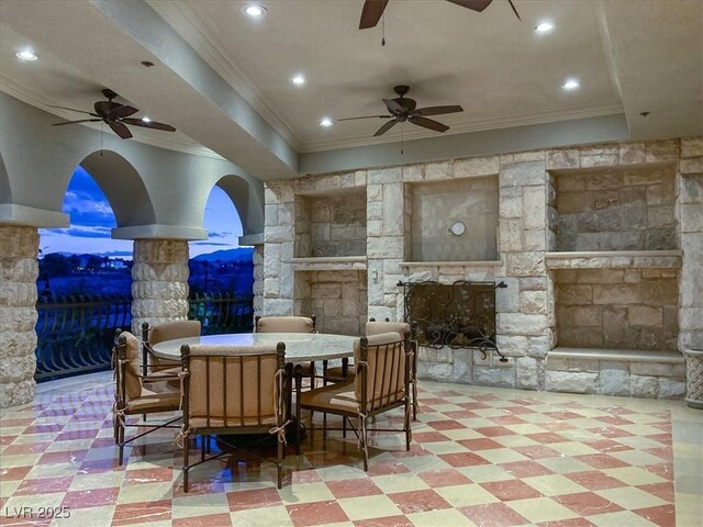 9101 Alta Dr Unit 203, Las Vegas, NV 89145 - view of patio / terrace featuring ceiling fan, an outdoor stone fireplace, and outdoor dining space