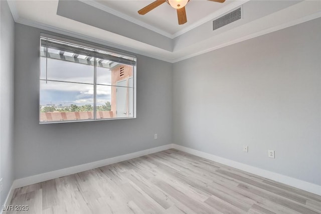 27 E Agate Ave Unit 505, Las Vegas, NV 89123 - unfurnished room featuring ornamental molding, wood finished floors, ceiling fan, a raised ceiling, and baseboards