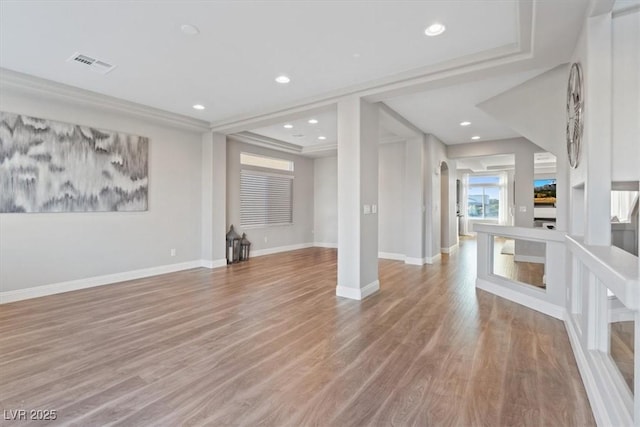6056 Atlantis Dream Ave, Las Vegas, NV 89139 - unfurnished living room with light wood-style floors and recessed lighting