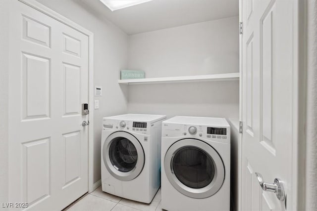 6056 Atlantis Dream Ave, Las Vegas, NV 89139 - laundry area featuring washer and dryer and light tile patterned flooring